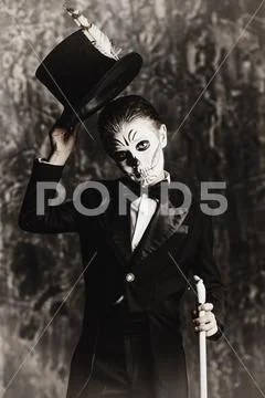 Child boy with carnival make-up of skeleton Stock Photos