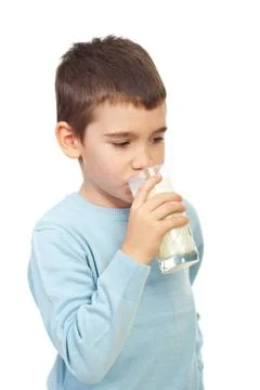 Child boy drinking milk Foto stock