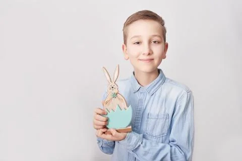 Child boy with easter bunny. Happy Easter holiday background concept. Boy wit Stock Photos