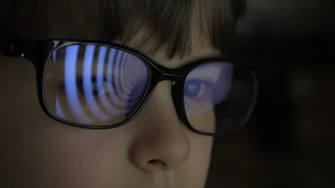 Child Boy With Glasses Watching Hypnotic Screen. Influence of Media on Peop.. Stock Footage 329454955