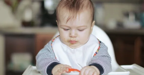Child boy is naughty at the table Stock-Footage 105006721