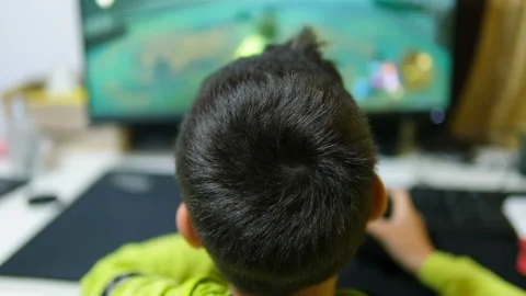Child boy playing console game on at home,kids computer videogames addiction Stock Footage 213064531
