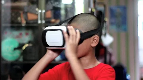 Child boy playing VR at home Stock Footage 171294503