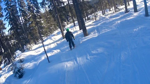 Child boy skiing through forest. Stock Footage 86283617