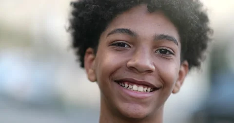 Child boy smiling to camera portrait, mixed race kid, ethnically diverse boy  Stock Footage 144358177