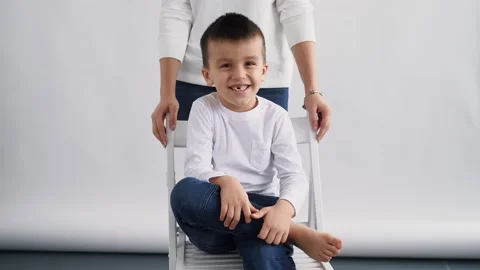 Child boy smiling to camera portrait, white race kid, ethnically diverse boy Video stock 174354831