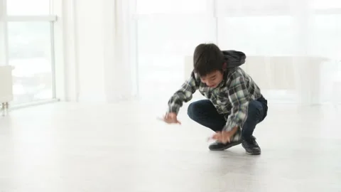 Child boy standing on hands Stock Footage 221173983