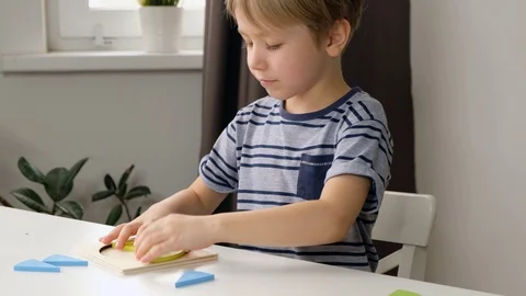 Child boy toddler doing simple math exercises with fractions at school, close up Stock Footage 125180603