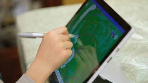 Child boy use digital graphic tablet for remote school paint drawing,technology Stock Footage 154262164