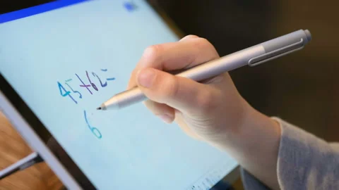 Child boy use graphic tablet for remote schooling,kids education technology Stock Footage 154220447
