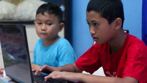 Child boy using his laptop to learning online Stock-Footage 169820460