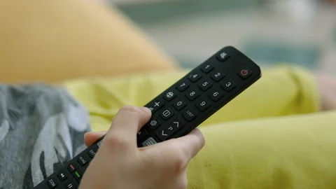 Child browse smart tv app,zapping channels on leisure time,kids tech lifestyle Stock Footage 231530985