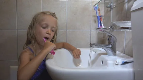 Child Brushing Teeth in Bathroom on Sleeping, Little Girl, Kid with Toothbrush Stock Footage 41236087