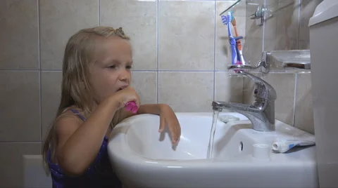 Child Brushing Teeth in Bathroom on Sleeping, Little Girl, Kid with Toothbrush Stock Footage 41236103