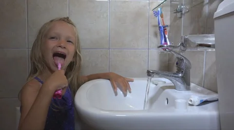 Child Brushing Teeth in Bathroom on Sleeping, Little Girl, Kid with Toothbrush Stock Footage 41236127
