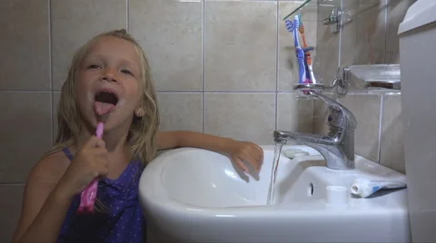 Child Brushing Teeth in Bathroom on Sleeping, Little Girl, Kid with Toothbrush Stock Footage 41236157