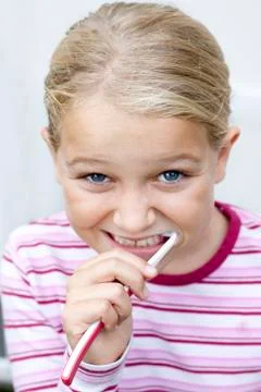 Child brushing teeth Stock Photos