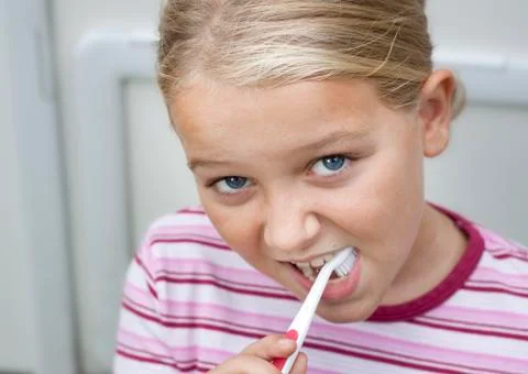Child brushing teeth Stock Photos