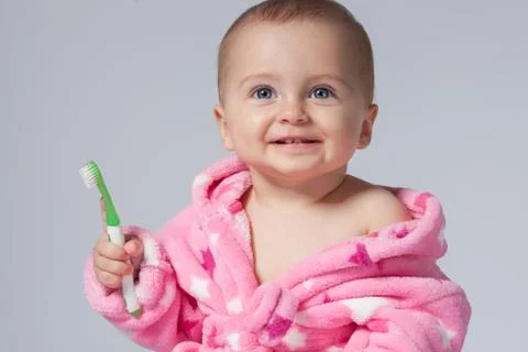 Child brushing teeth Stock Photos