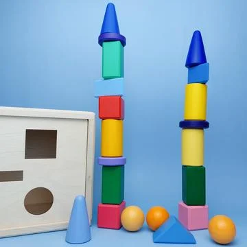 The child built a tower of multi-colored geometric shapes against the background Stock Photos