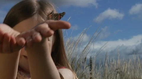 Child with butterfly Stock-Footage 22636510