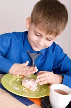 Child with cake Stock Photos