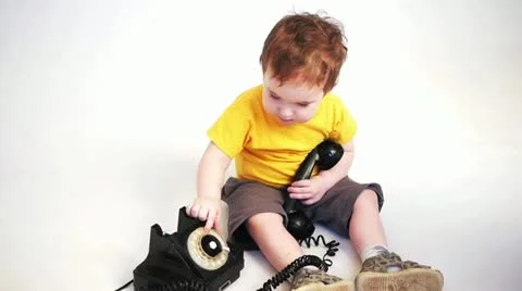 Child calling on a phone Stock Footage 20634333