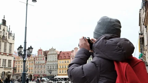 A child with a camera in his hands. The boy learns to photograph. Stock Footage 110636921