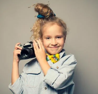 Child with camera. Stock Photos