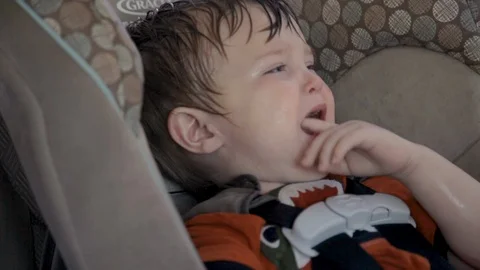 Child in car crying Stock Footage 108391014