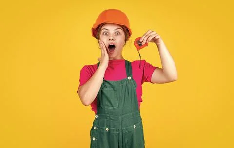 Child care development. future engineer. happy kid use measure repairing tool Foto stock