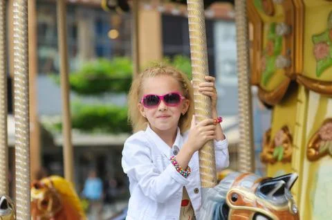 Child On Carousel Stock Photos