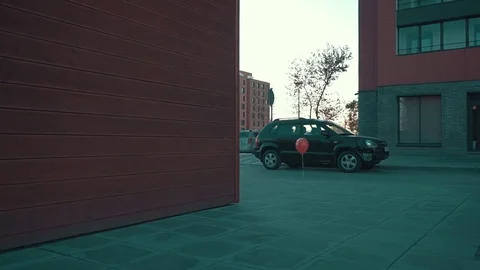 A child is catching up with a balloon Stock Footage 85259195