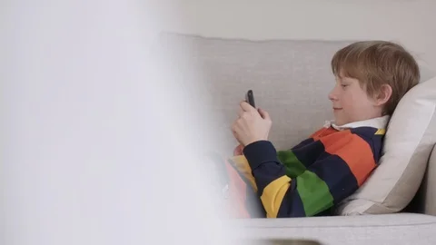 Child on cell phone Stock Footage 127051276