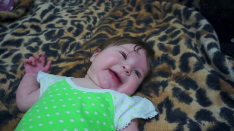 Child cheerfully laughs Stock Footage 61197688