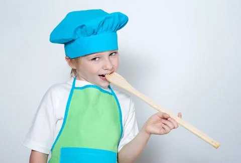 Child as a chef cook 库存照片