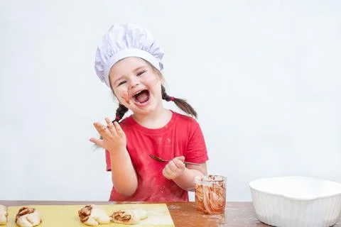 Child in the chef hat Stock Photos