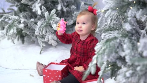 Child by Christmas Tree Stock-Footage 224929838