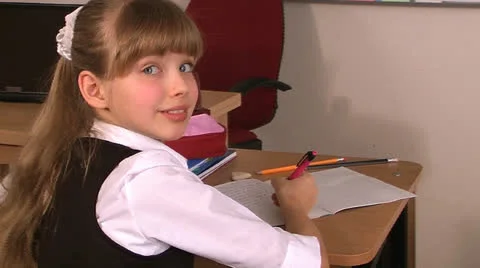 Child in classroom near blackboard. Stock Footage 24001855