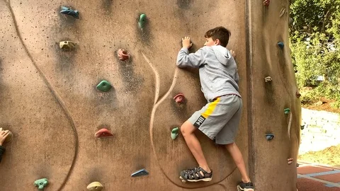 Child climbing climbing wall Video stock 120505952