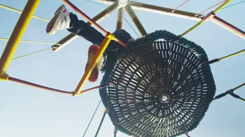Child climbing on a rope frame Video stock 46181666