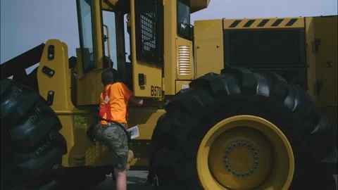 Child Climbing Into Tractor Stock Footage 201624776