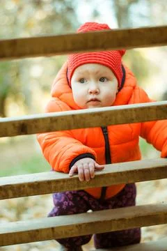 The child climbs the steps on the playground Stock Photos