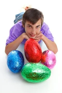 Child with colourful easter eggs Stock Photos