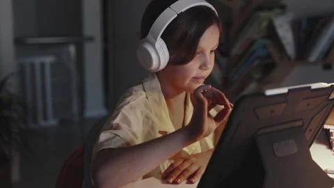 Child Communicates with Teacher Online. Distant School Learning Concept. Stock Footage 255786277