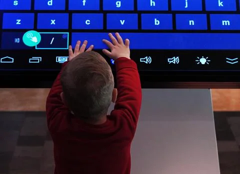 Child with computer Stock Photos