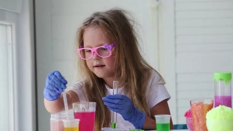 The child conducts experiments. Stock Footage 134544015