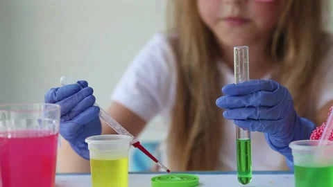 The child conducts experiments. Stock Footage 134546485