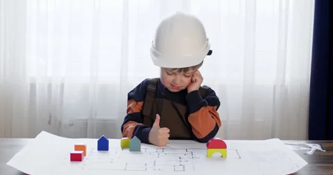 A child in a construction helmet Video stock 252939466