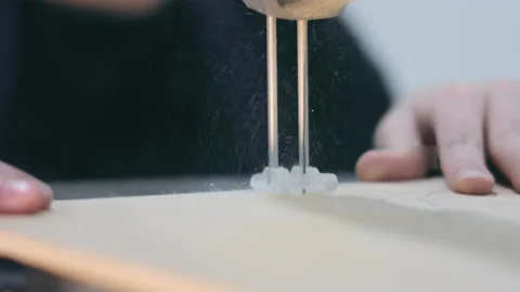 A child at a cool crafts class saws a pattern from plywood Video stock 231475987